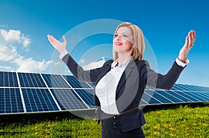 Successful solar power or green energy saleswoman