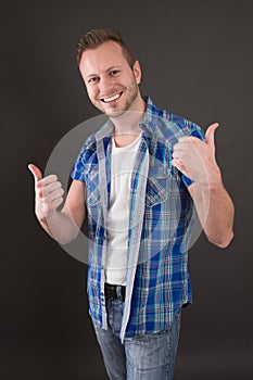 Successful student - man isolated on black background