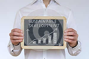 Successful sustainable development chart on chalkboard