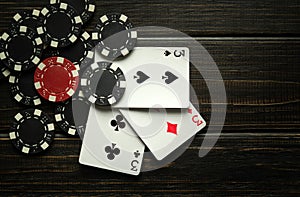 Successful win with three aces playing cards. Poker game with three of kind or set combination on vintage black table