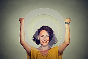 Successful woman with arms up