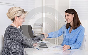 Successful woman business team or handshake in a job interview.