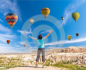 Successful woman and hot air balloon Concept motivation, inspiration