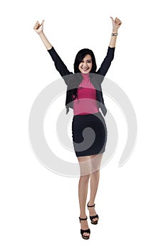 Successful woman raise hands with thumbs-up