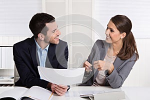 Successful young business people working in a team.