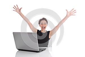 Successful young business woman at desk with computer