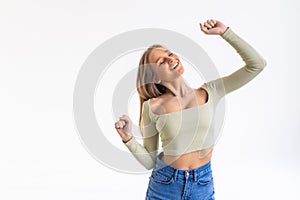 Successful young business woman happy for her success isolated on white background