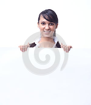 Successful young business woman showing blank banner