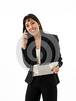 Successful young business woman talking on phone holding a folder. Isolated on white background