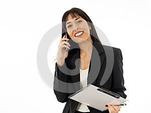 Successful young business woman talking on phone holding a folder. Isolated on white background