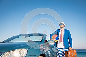 Successful young businessman on a beach