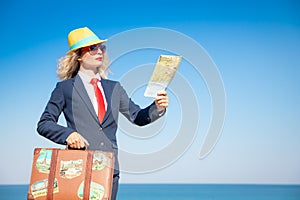 Successful young businesswoman on a beach