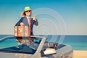 Successful young businesswoman on a beach