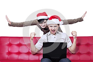 Successful young christmas couple