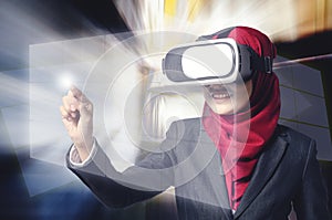 Successful young muslimah businesswomen wearing virtual reality headset over abstract double exposure background