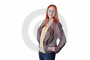 Successful young redhead business woman with glass