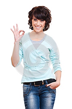 Successful young woman showing okay sign
