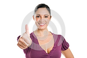 Successful young woman showing thumb up