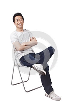 Successful youngman sitting posture