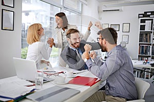 Successfully  business  meeting.Happy business team on workplace photo