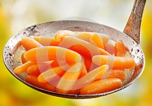Succulent steamed whole baby carrots