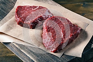 Succulent tender raw lean beef steaks lying