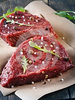 Succulent tender raw lean beef steaks lying