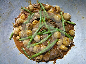 Succulent vegetable stew frying in a hot wok