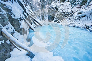 Frozen creek in Sucha Bela gorge in Slovak Paradise during winter