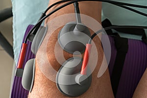 Suction cups applied to a knee in physiotherapy