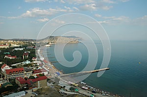 Sudak, Crimea. Genoese fortress. View of the city beaches of Sudak. Aerial view. View from the Genoese fortress on the