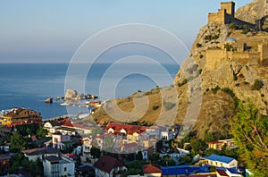 SUDAK, CRIMEA - July, 2020: Aereal view of coastline in summer morning