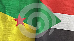 Sudan and French Guiana two flags textile cloth 3D rendering