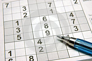 Sudoku puzzle & pen