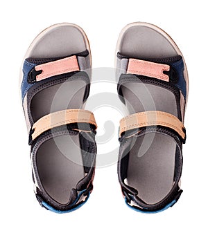 Suede sandals, velcro straps and flat sole white background isolated close up top view, trekking sandal shoes, sport footwear