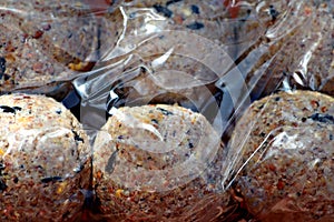 Suet  balls for birds in plastic bag