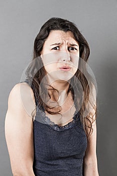 Suffering woman expressing disappointment and anxiety