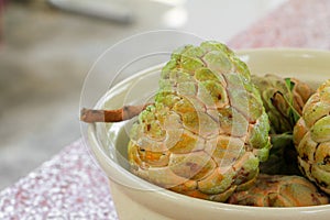 Sugar apple ripe in a bowl. no retouch skin, organic fruit and Vegetables concept.custard apple, annona, sweetsop