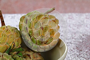 Sugar apple ripe in a bowl. no retouch skin, organic fruit and Vegetables concept.custard apple, annona, sweetsop