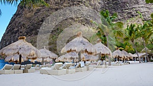 Sugar beach Saint Lucia ,white tropical beach palm trees and luxury beach chairs St Lucia Caribbean