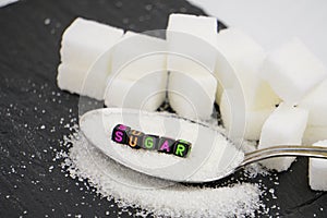 Sugar block letters in crossword