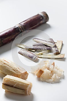 Sugar cane condiments on white table