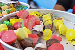 Sugar coated jelly candy in the shape of fruit or sugar bears. Assorted gummy candies