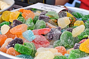 Sugar coated jelly candy in the shape of fruit or sugar bears. Assorted gummy candies