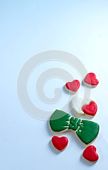 Sugar cookies floating on a light background