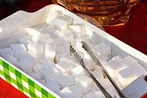 Sugar cubes or fructose cubes displayed in a box