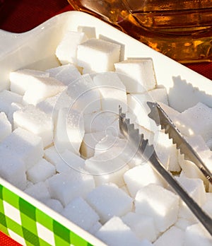 Sugar cubes or fructose cubes displayed in a box