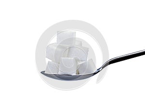 Sugar cubes on spoon