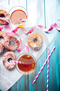 Sugar donuts and sima