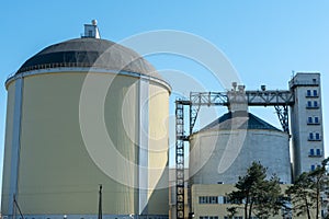sugar factory. Sugar Plant Silo and Elevator Tower. Large concrete barrels of sugar. Granary elevator. Agro manufacturing plant